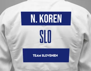 Judo GI with a backnumber showing the name Nika Koren from Team Slovenien