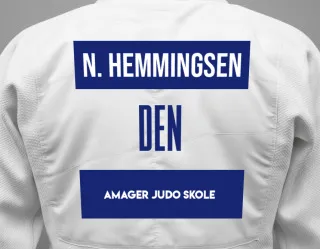 Judo GI with a backnumber showing the name Nikita Hemmingsen from Amager Judo Skole