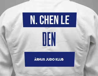 Judo GI with a backnumber showing the name Nina Chen Le from Århus Judo Klub