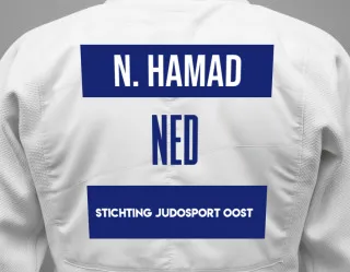 Judo GI with a backnumber showing the name Noura Hamad from Stichting Judosport Oost
