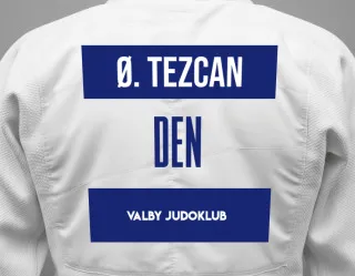 Judo GI with a backnumber showing the name Ømer Tezcan from Valby Judoklub