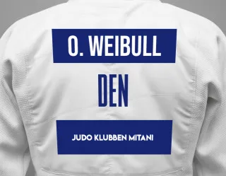 Judo GI with a backnumber showing the name Olivia Birk Weibull from Judo Klubben Mitani