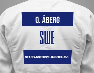 Judo GI with a backnumber showing the name Oscar Åberg from Staffanstorps Judoklubb