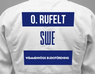 Judo GI with a backnumber showing the name Oskar Rufelt from Wemmenhögs Budoförening