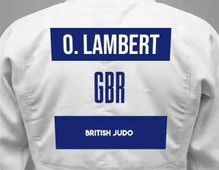 Judo GI with a backnumber showing the name Owen Lambert from British Judo