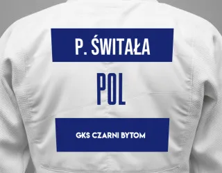 Judo GI with a backnumber showing the name Paweł świtała from GKS Czarni Bytom