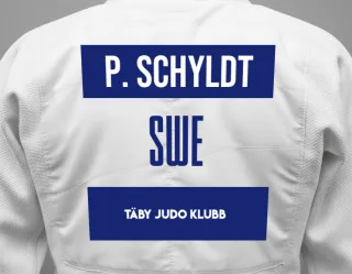 Judo GI with a backnumber showing the name Peter Schyldt from Täby Judo Klubb
