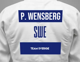 Judo GI with a backnumber showing the name Peter Wensberg from Team Sverige