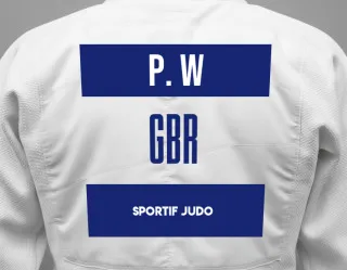 Judo GI with a backnumber showing the name Phoebe F. W from Sportif Judo