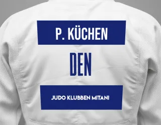 Judo GI with a backnumber showing the name Polly Küchen from Judo Klubben Mitani