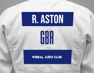 Judo GI with a backnumber showing the name Reece Aston from Wirral Judo Club