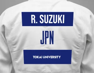 Judo GI with a backnumber showing the name Ren Suzuki from Tokai University