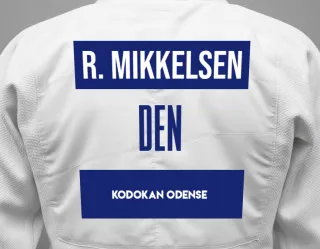 Judo GI with a backnumber showing the name René Mikkelsen from Kodokan Odense