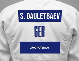 Judo GI with a backnumber showing the name Saifulla Dauletbaev from UJKC Potsdam