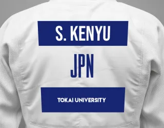 Judo GI with a backnumber showing the name Sasaki Kenyu from Tokai University