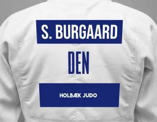Judo GI with a backnumber showing the name Simon Burgaard from Holbæk Judo