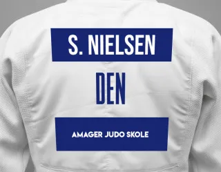 Judo GI with a backnumber showing the name Simon Gorm Nielsen from Amager Judo Skole