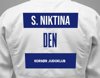 Judo GI with a backnumber showing the name Solomia Niktina from Korsør Judoklub