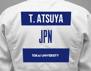 Judo GI with a backnumber showing the name Takano Atsuya from Tokai University