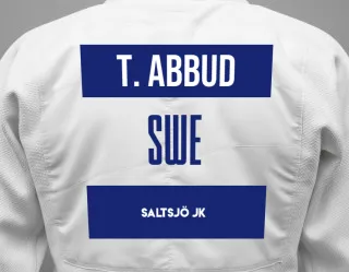 Judo GI with a backnumber showing the name Tammar Abbud from Saltsjö JK