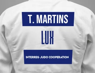 Judo GI with a backnumber showing the name Telma Martins from Interreg Judo Cooperation