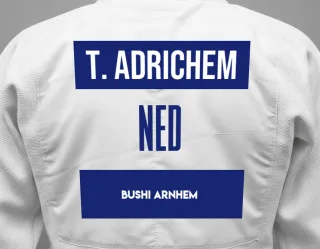Judo GI with a backnumber showing the name Thomas van Adrichem from Bushi Arnhem