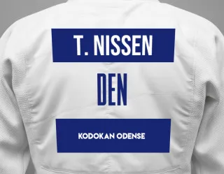 Judo GI with a backnumber showing the name Thorleif Høj Nissen from Kodokan Odense
