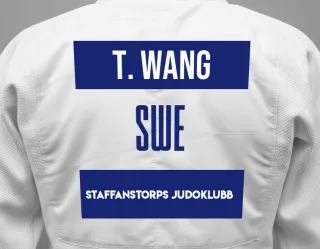 Judo GI with a backnumber showing the name Tiffany Wang from Staffanstorps Judoklubb