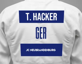 Judo GI with a backnumber showing the name Tim Hacker from JC Neubrandenburg