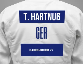 Judo GI with a backnumber showing the name Timm Hartnuß from Gadebuscher JV