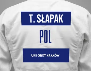 Judo GI with a backnumber showing the name Tymon Słapak from UKS Grot Kraków