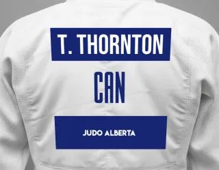Judo GI with a backnumber showing the name Tyson Thornton from Judo Alberta