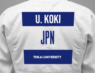 Judo GI with a backnumber showing the name Uchimura Koki from Tokai University