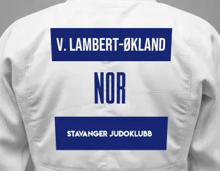 Judo GI with a backnumber showing the name Victoria Lambert-økland from Stavanger Judoklubb