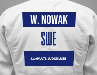 Judo GI with a backnumber showing the name Wiktor Nowak from Älmhults Judoklubb