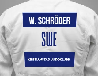 Judo GI with a backnumber showing the name William Schröder from Kristianstad Judoklubb