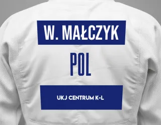 Judo GI with a backnumber showing the name Wojciech Małczyk from UKJ CENTRUM K-L