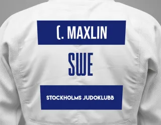 Judo GI with a backnumber showing the name (x) Miljon Maxlin from Stockholms Judoklubb