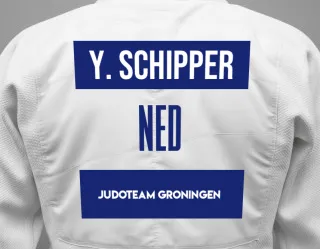 Judo GI with a backnumber showing the name Yaël Schipper from Judoteam Groningen