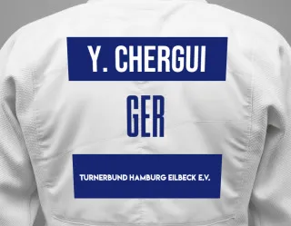 Judo GI with a backnumber showing the name Yassin Chergui from Turnerbund Hamburg Eilbeck e.V.