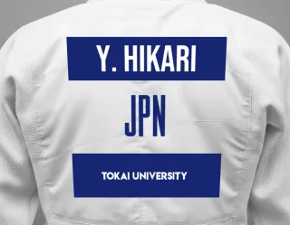 Judo GI with a backnumber showing the name Yoshioka Hikari from Tokai University